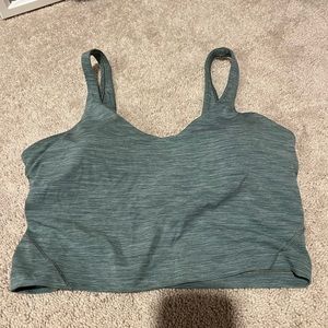Lululemon Align cropped tank. Worn once. Rip tag removed. Pads included.
